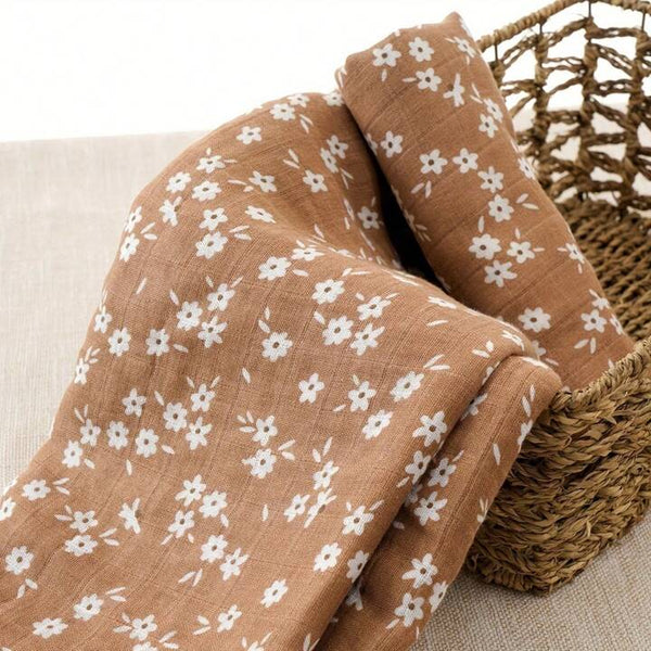 Brown floral muslin swaddle blanket