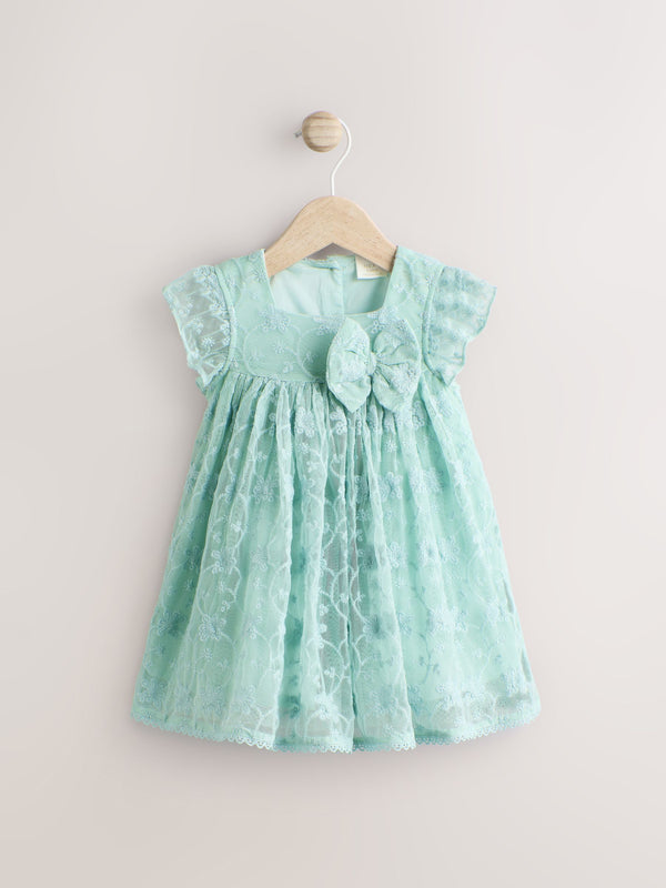 Sage Green Broderie Mesh Bow Baby Dress (0mths-2yrs)