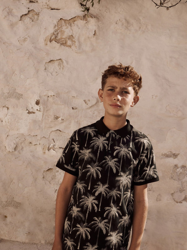 Black Palm All-Over Print Short Sleeve 100% Cotton Polo Shirt (3-16yrs)