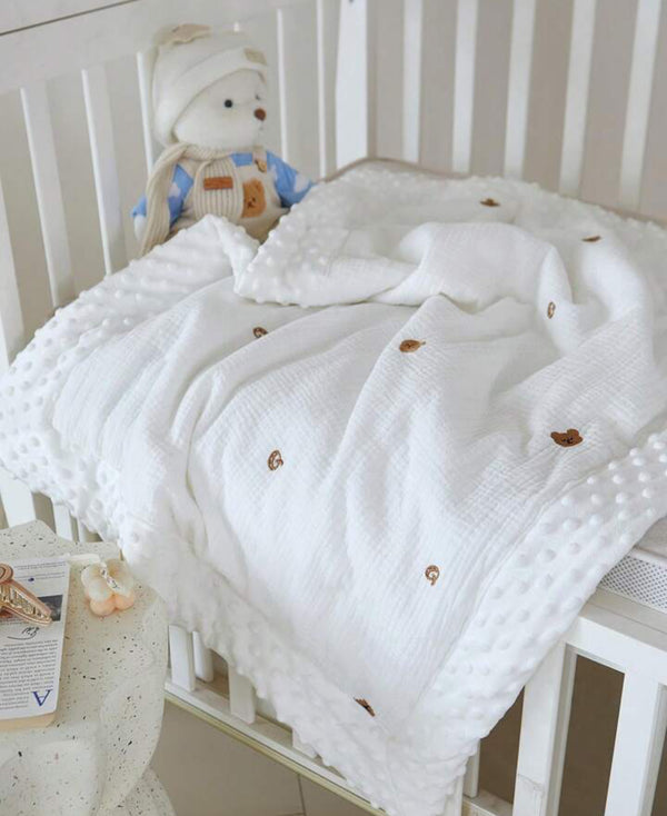 Embroidered bear bump baby quilt