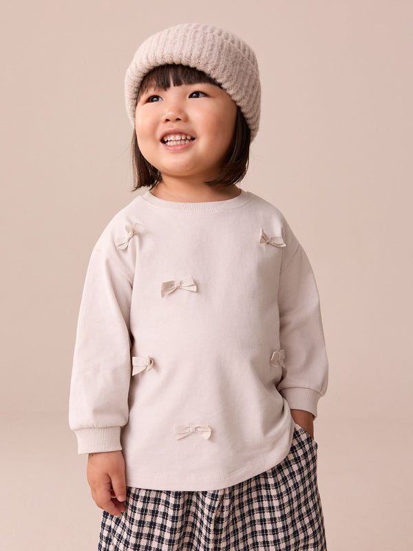 Cream Bow Applique Long Sleeve Bow Appliqué Top (3mths-7yrs)