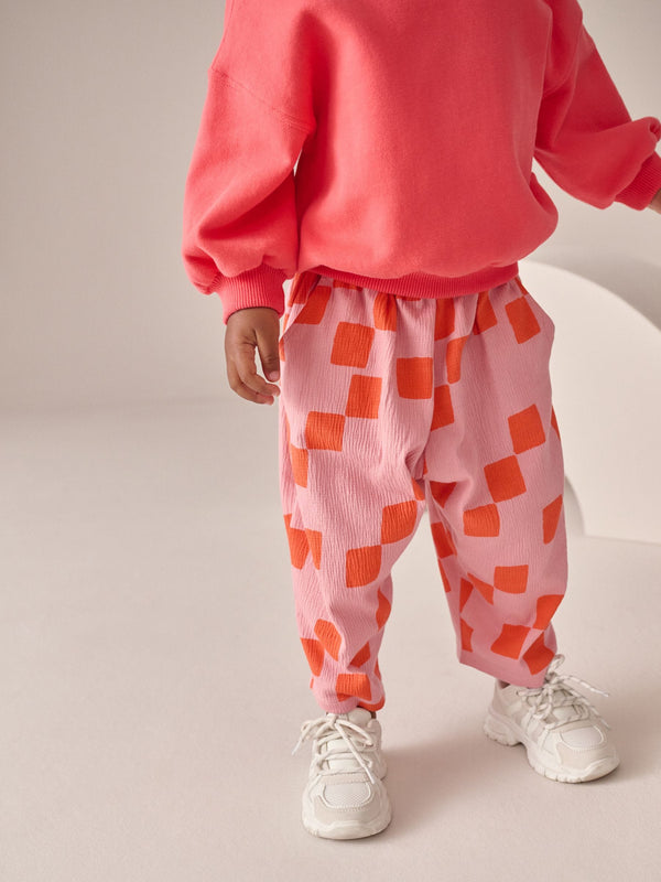 Pink Checkerboard Barrel Trousers (3mths-7yrs)
